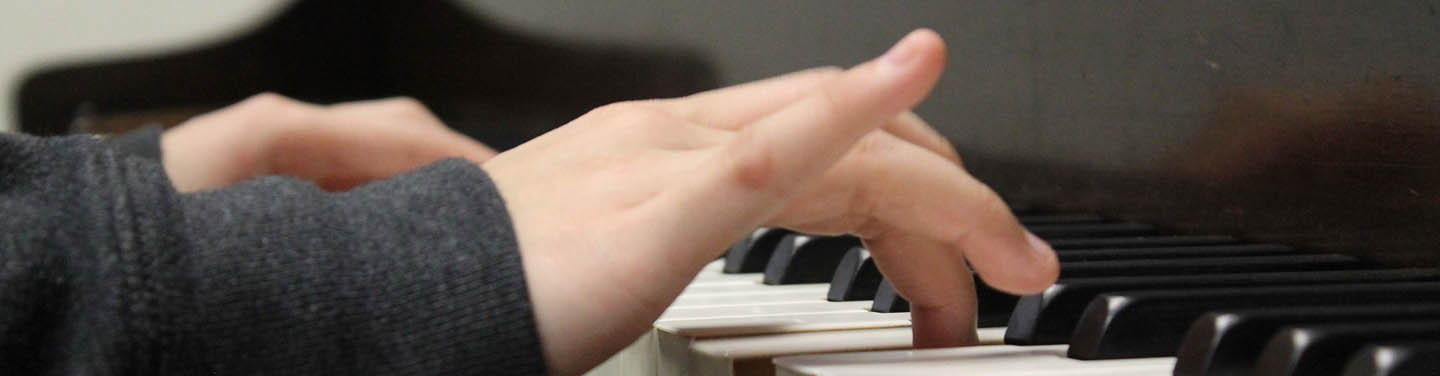 Small hands at the piano